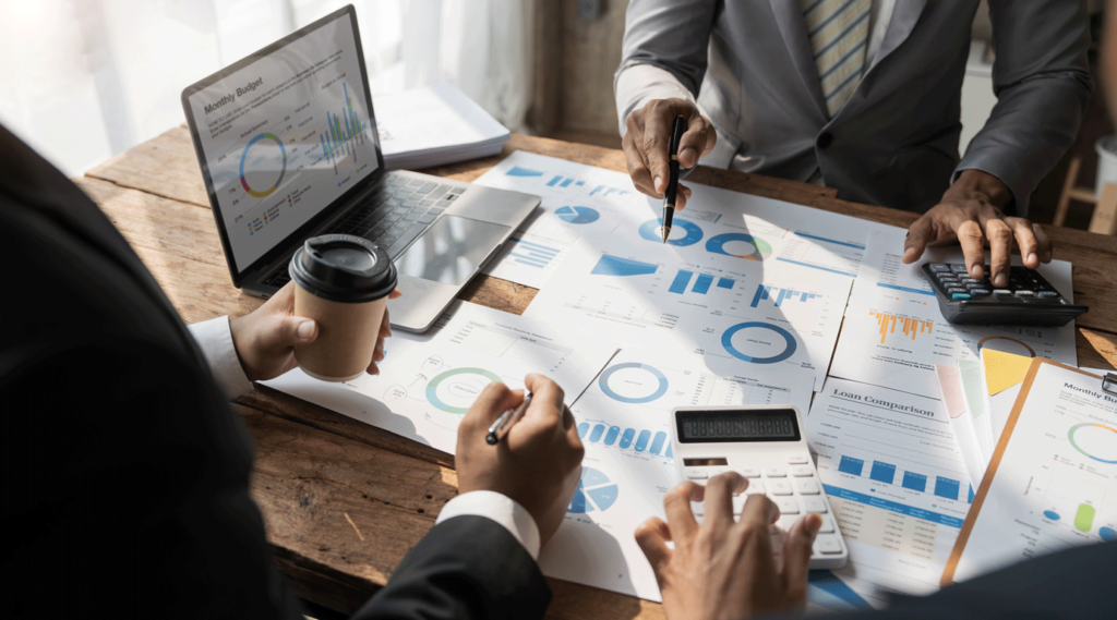 business-people-meeting-using-laptop-computer-calc-2025-01-16-13-14-45-utc